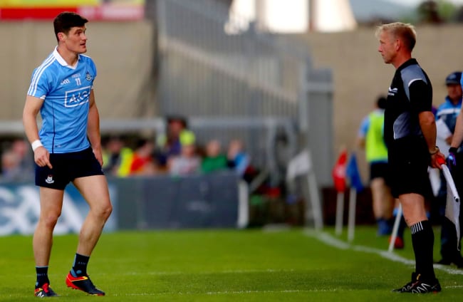 Diarmuid Connolly with linesman Ciaran Branagan in Portlaoise last month.