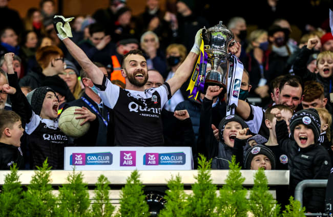 Kilcoo's Conor Laverty and lifts the cup.