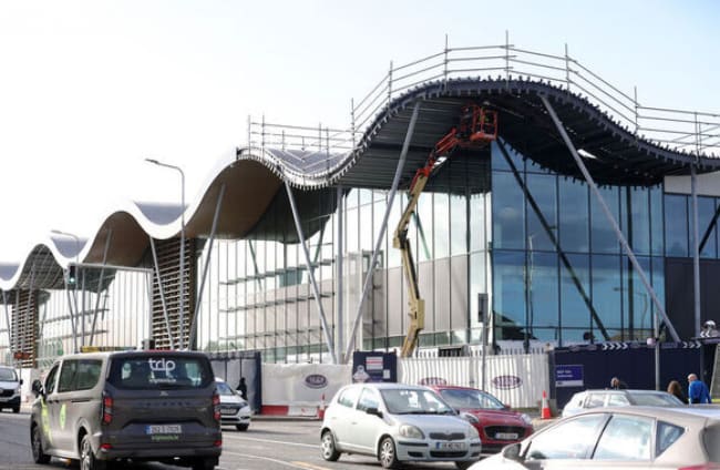 Dublin Irish Leinster Ireland. Photo shows construction workers on a crane as work is going on as Crumlin Shopping Centre gets a new make over.