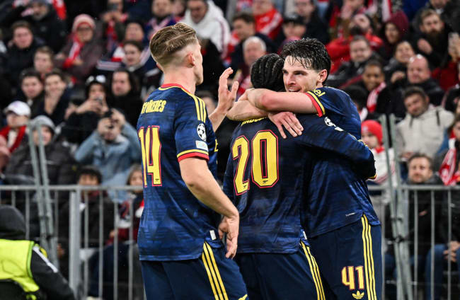 Arsenal players celebrate a goal by Declan Rice.